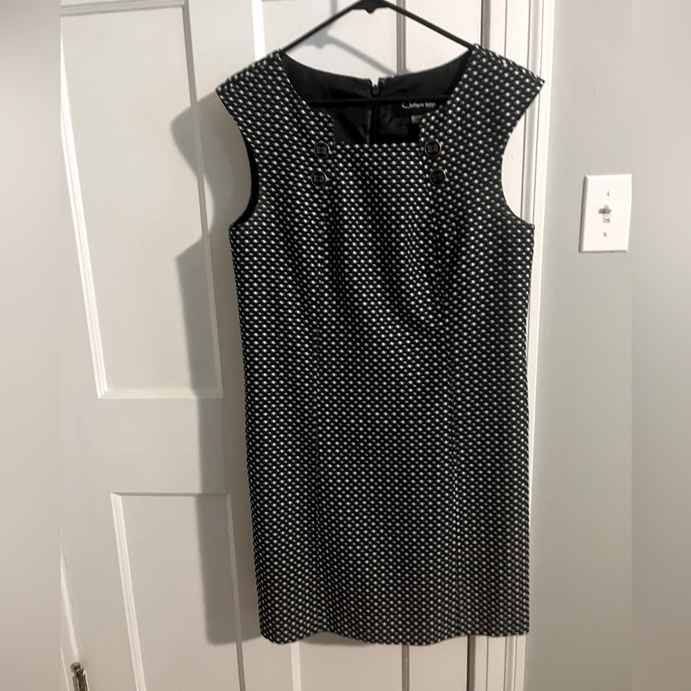 Cute knee length tweed dress.